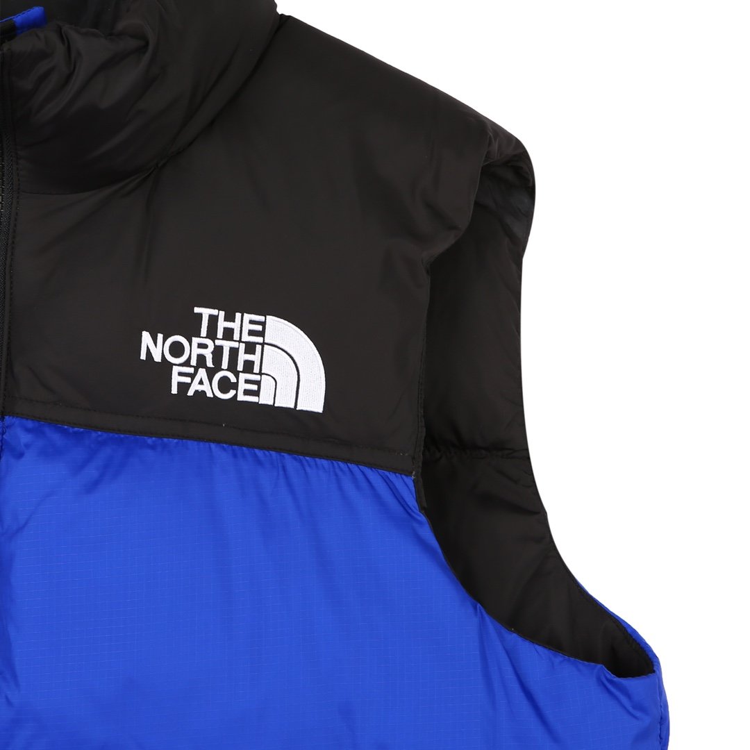 The North Face 1996 Retro Nuptse Vest “Bolt Blue” – Essência clássica, visual impactante
