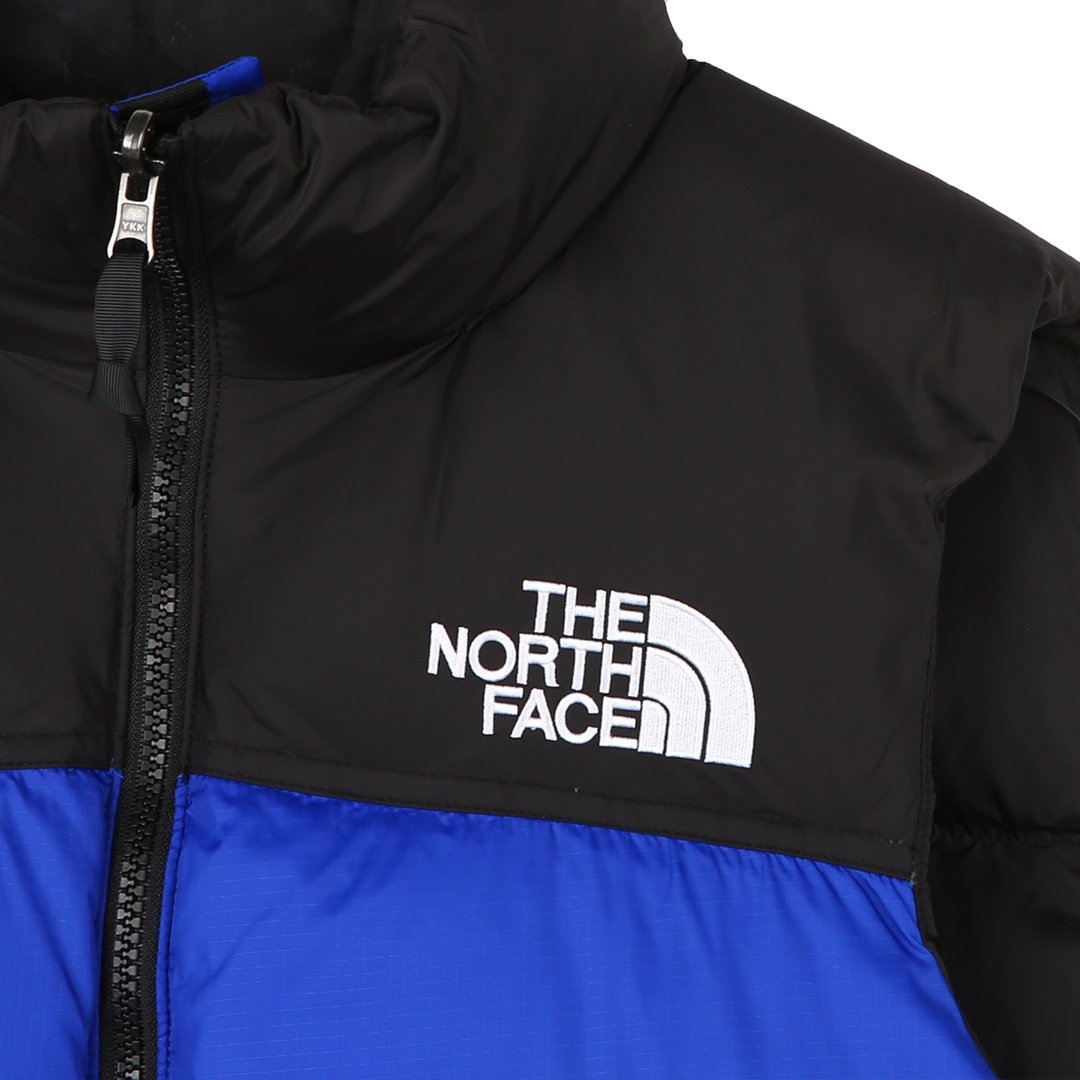 The North Face 1996 Retro Nuptse Vest “Bolt Blue” – Essência clássica, visual impactante