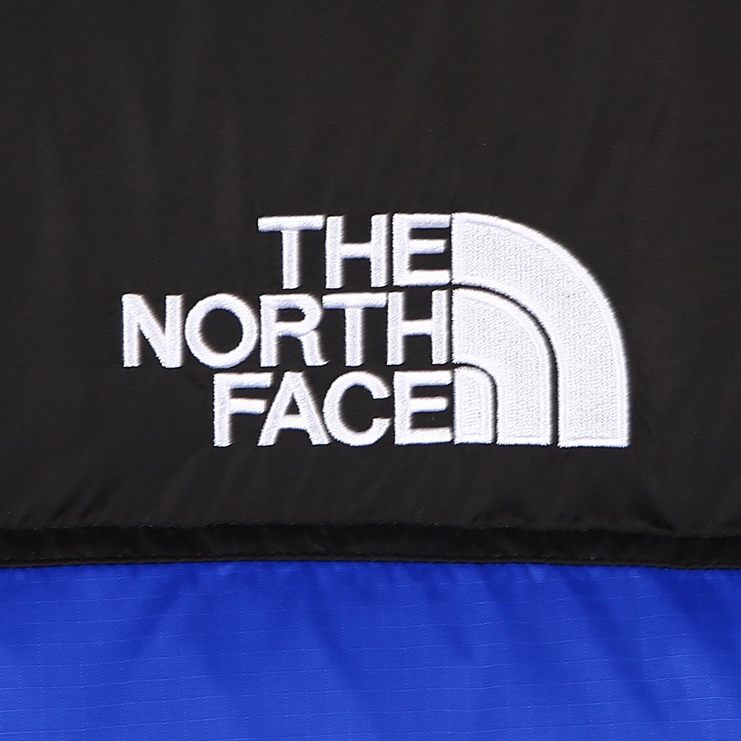 The North Face 1996 Retro Nuptse Vest “Bolt Blue” – Essência clássica, visual impactante