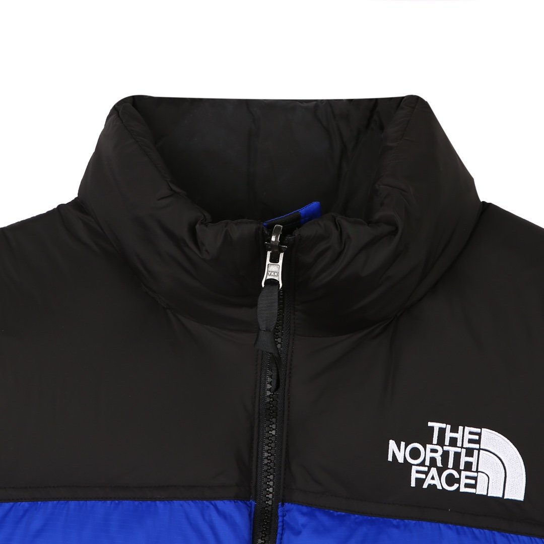 The North Face 1996 Retro Nuptse Vest “Bolt Blue” – Essência clássica, visual impactante