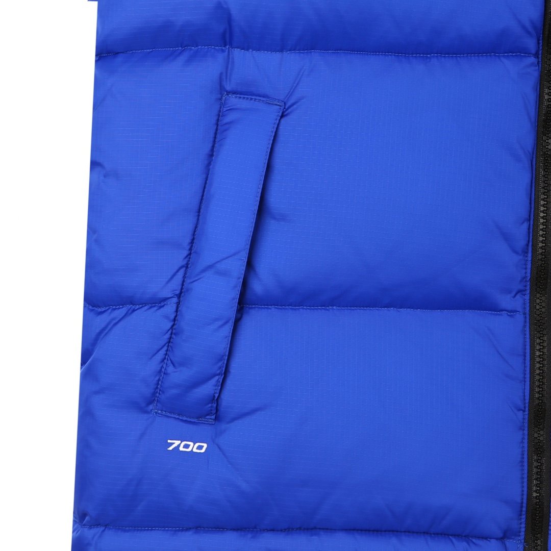 The North Face 1996 Retro Nuptse Vest “Bolt Blue” – Essência clássica, visual impactante