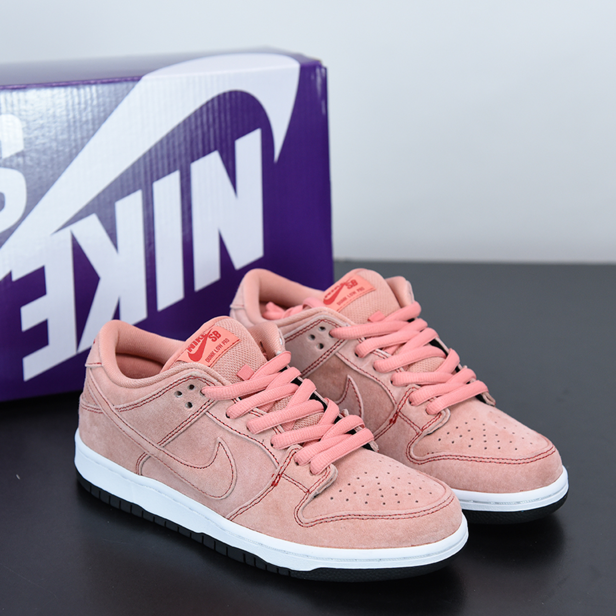 Nike thea 2025 atomic pink