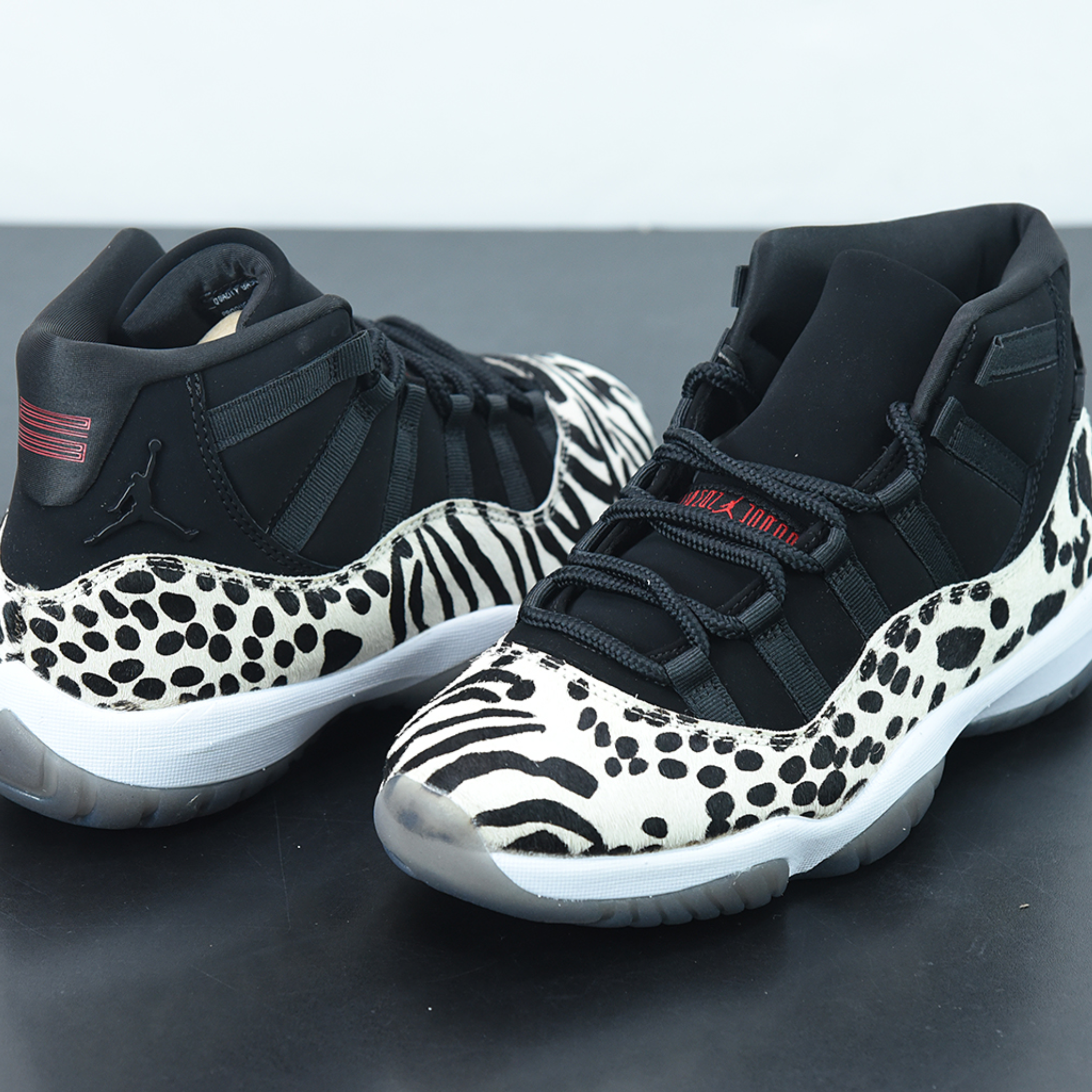 WMNS Nike Air Jordan 11 Retro "Animal Instinct"