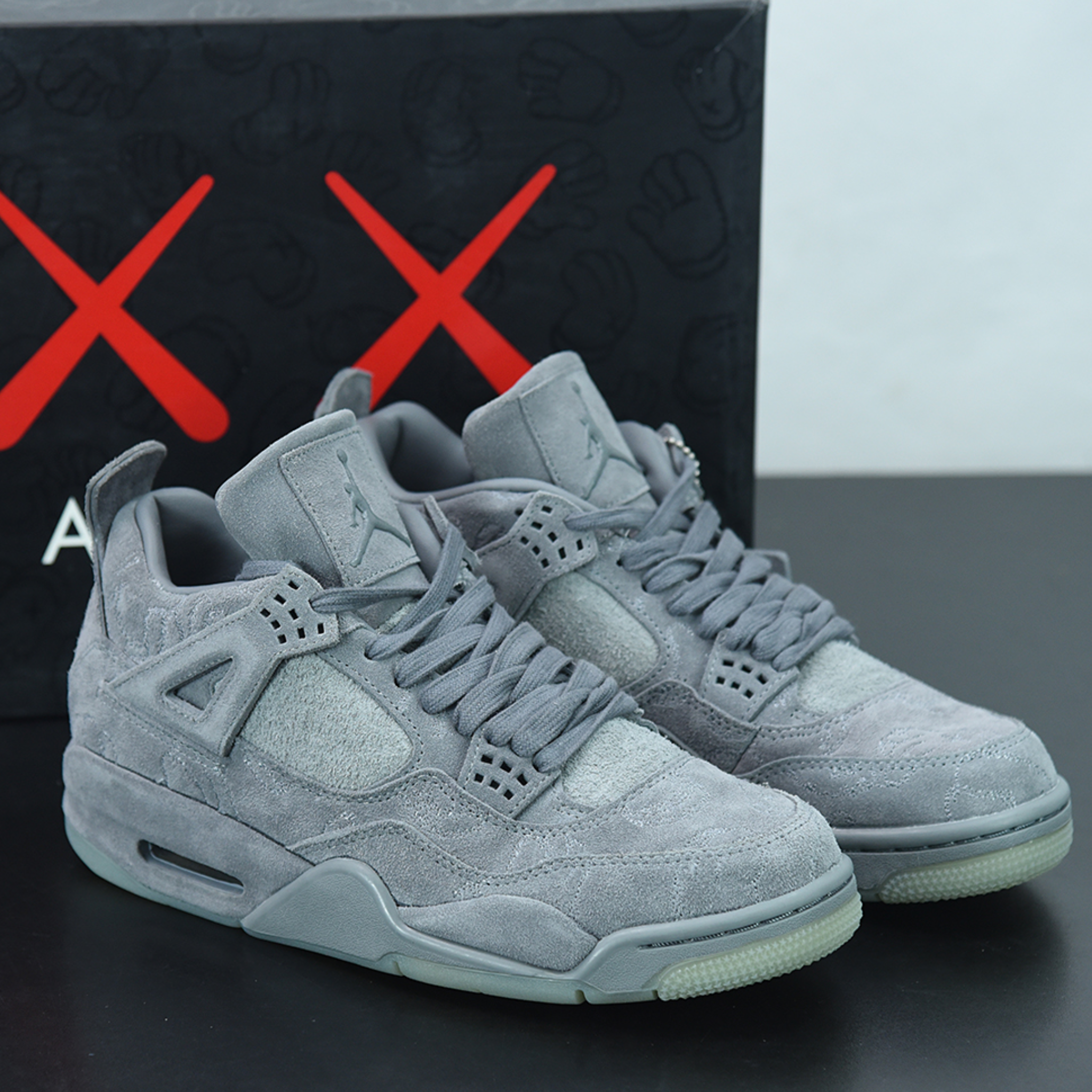 KAWS x Air Jordan 4 Retro "Cool Grey"