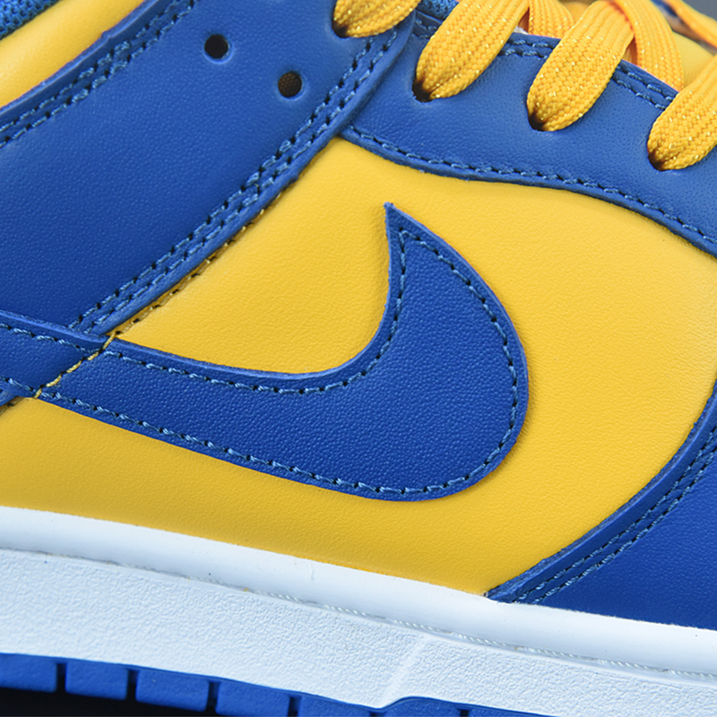 Blue yellow deals nikes